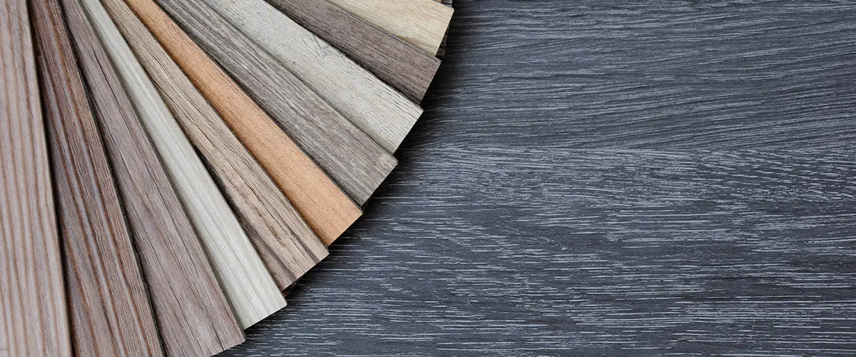 Laminate vs vinyl flooring samples