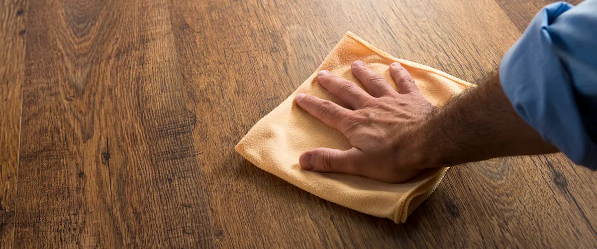 wiping stains off the hardwood floor