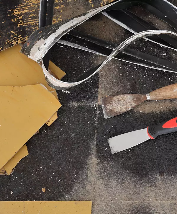 Old tiles removal from floor in a room or kitchen